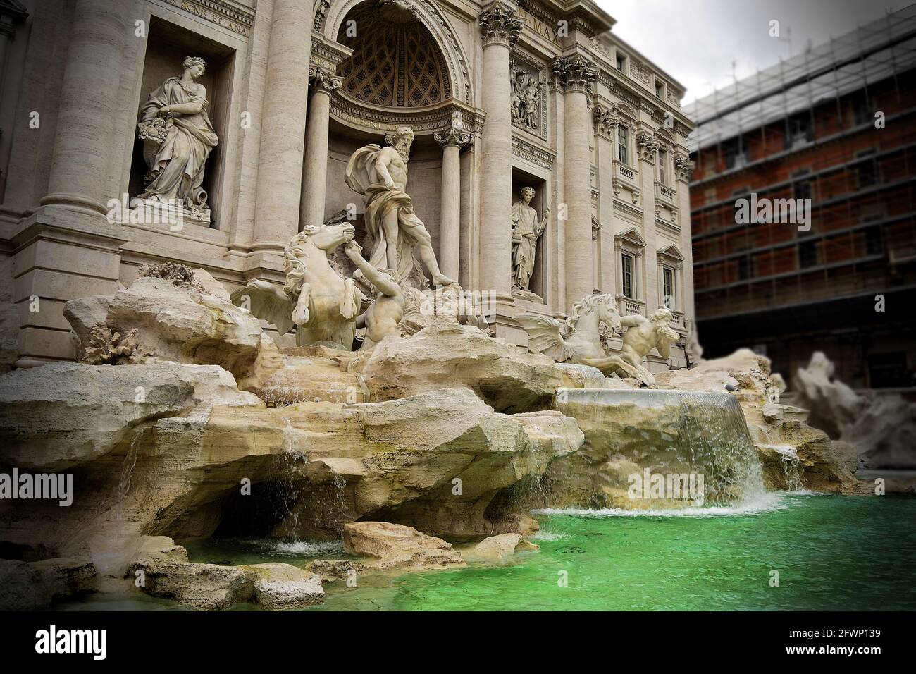 ROME, ITALY - Feb 07, 2016: The sculpture, statues and architecture of the Trevi Fountain in the capital city of Rome, Italy on a winter and cloudy da Stock Photo
