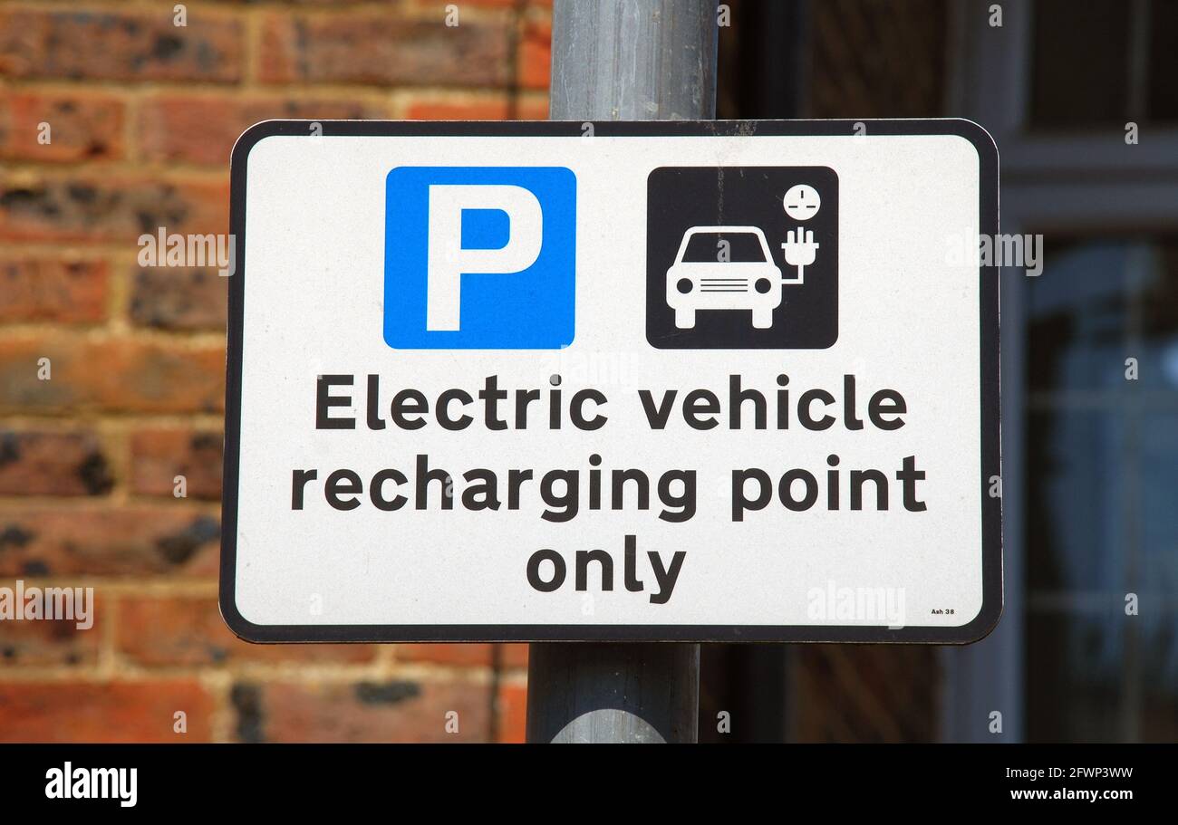 An electric vehicle charging point sign in a car park at Tenterden in