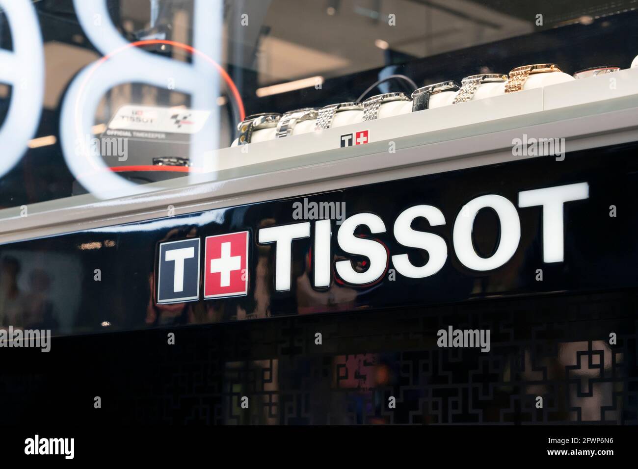 Tissot-brand logo of a Swiss watch on the counter in a shopping center . Krasnoyarsk, Russia, May 15, 2021. Stock Photo