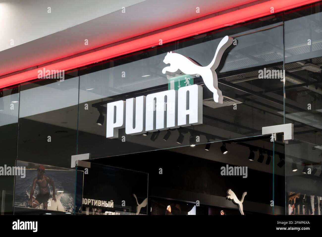 puma brand logo, a sign above the entrance to the company's brand store for  the production of sportswear and accessories. Krasnoyarsk, Russia, May 15  Stock Photo - Alamy