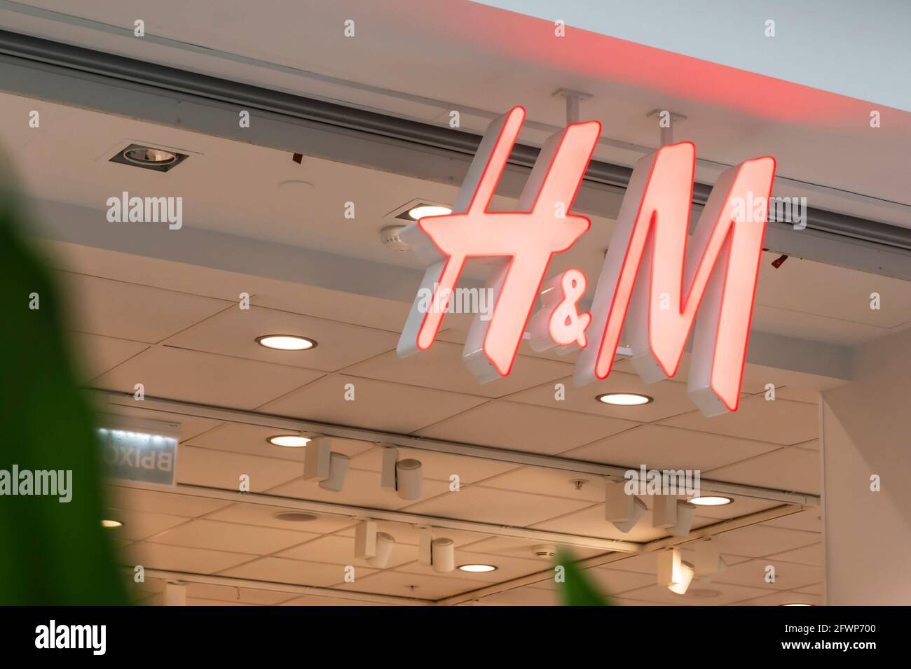 Hm store logo in mall hi-res stock photography and images - Alamy