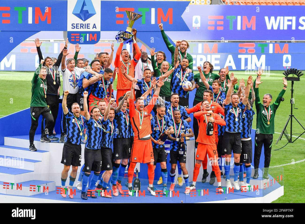 Samir Handanovic of FC Internazionale lifts the Serie A Trophy whilst his team mates celebrate after the match between FC Internazionale and Udinese C Stock Photo