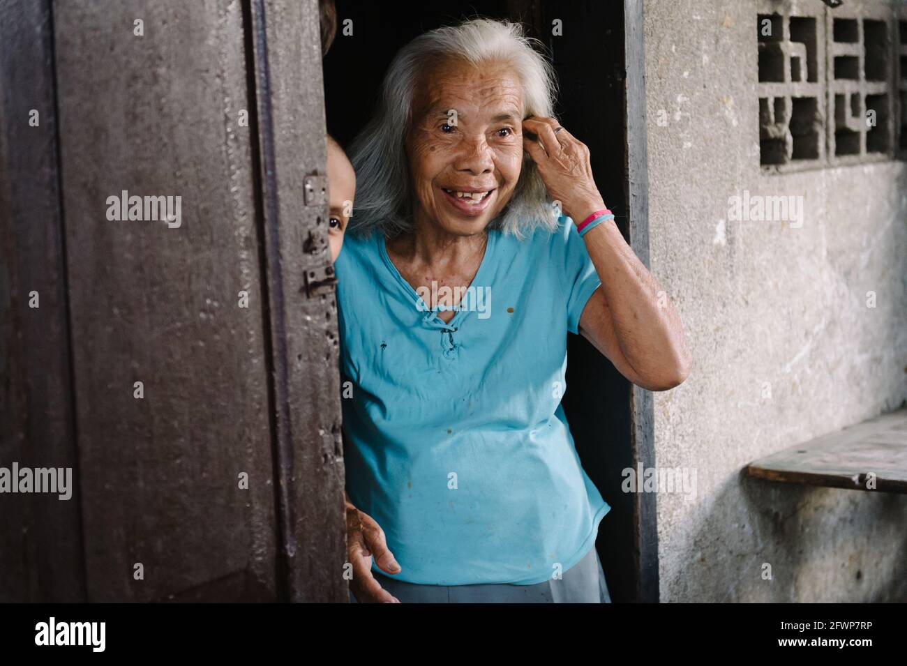 Old lady standing hi-res stock photography and images - Alamy