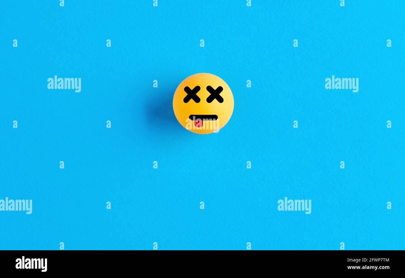 Dead face emoticon or icon on a ball on blue background. Missing web page, link or file problem. Stock Photo