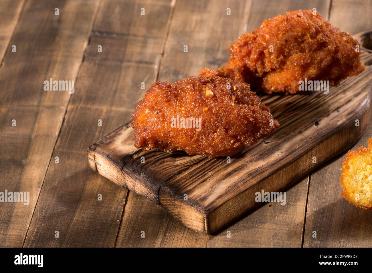 Tasty fried sweet corn croquettes; delicious Colombian food. Stock Photo