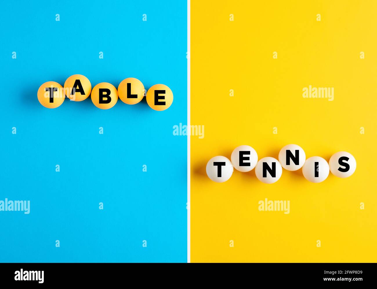 The word table tennis written on table tennis balls on blue and yellow