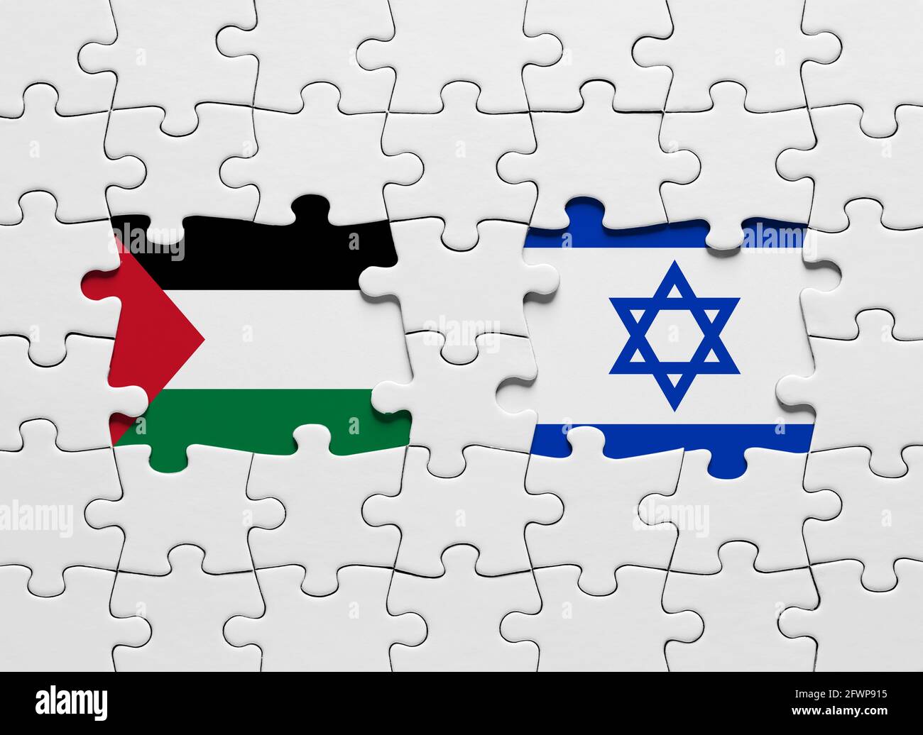 Jigsaw puzzle with the national flags of Israel and Palestine Stock Photo -  Alamy