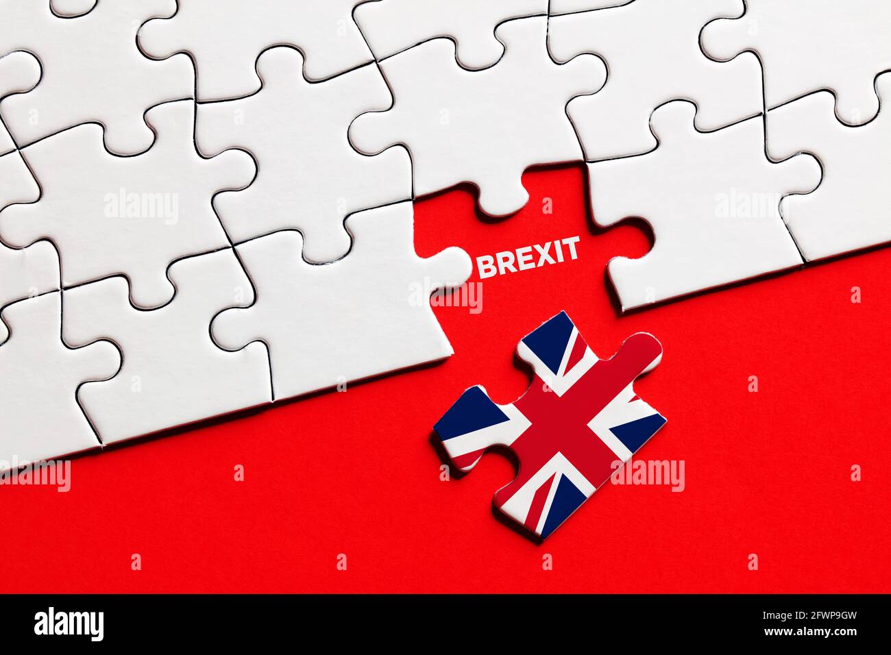 Missing puzzle piece with Great Britain flag exits the European Union. Brexit concept. Stock Photo