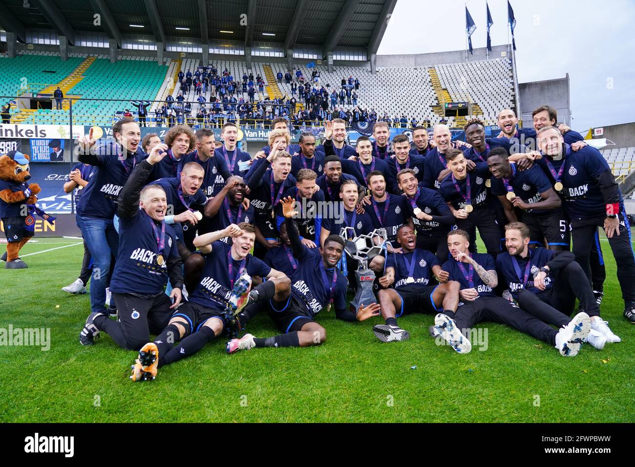 BRUGGE, BELGIUM - MAY 23: Team of Club Brugge receiving the Jupiler Pro League Trophy after winning the Jupiler Pro League for the second year in a ro Stock Photo