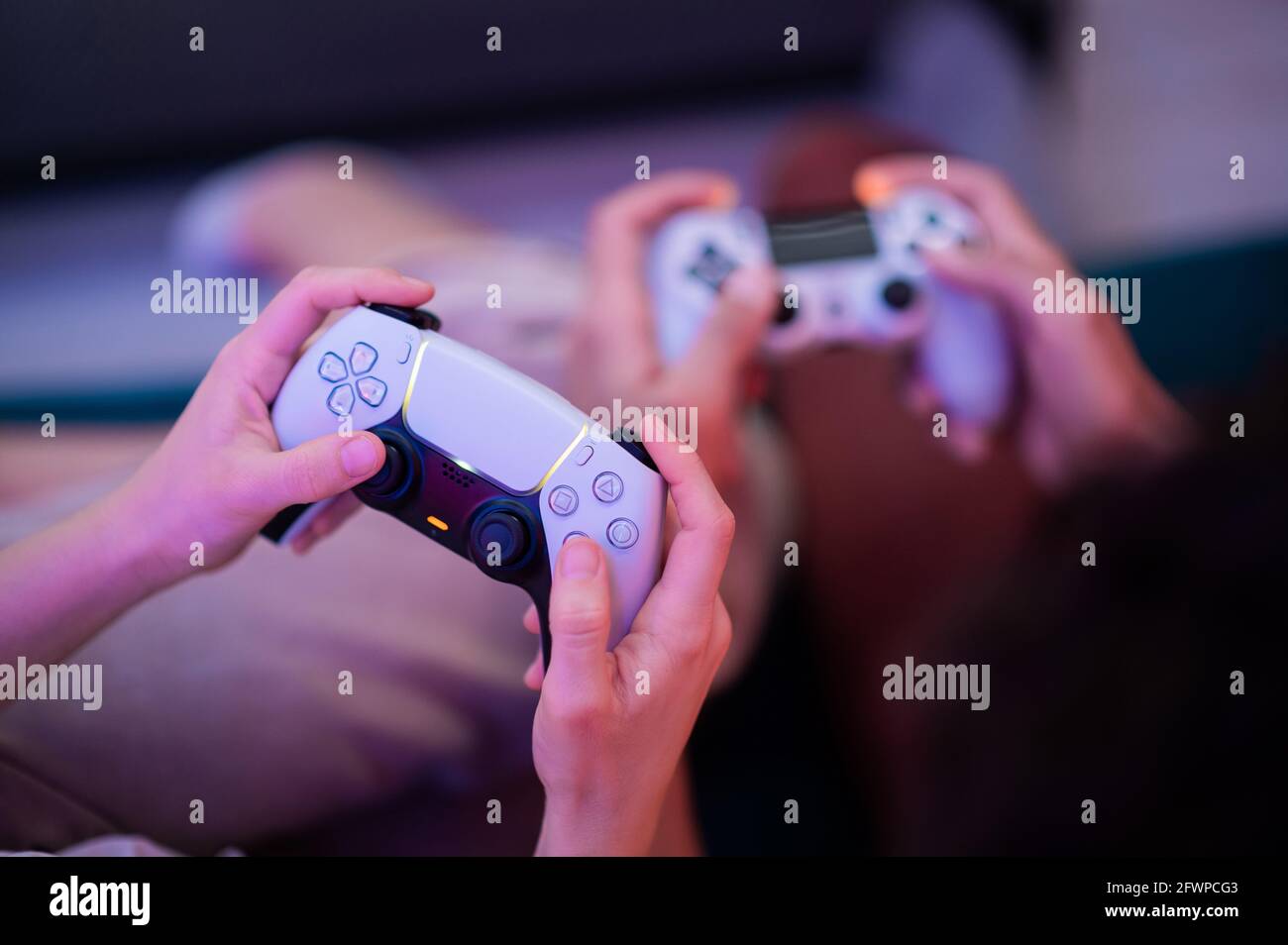 Different generations of PlayStation console controllers PS5 DualSense