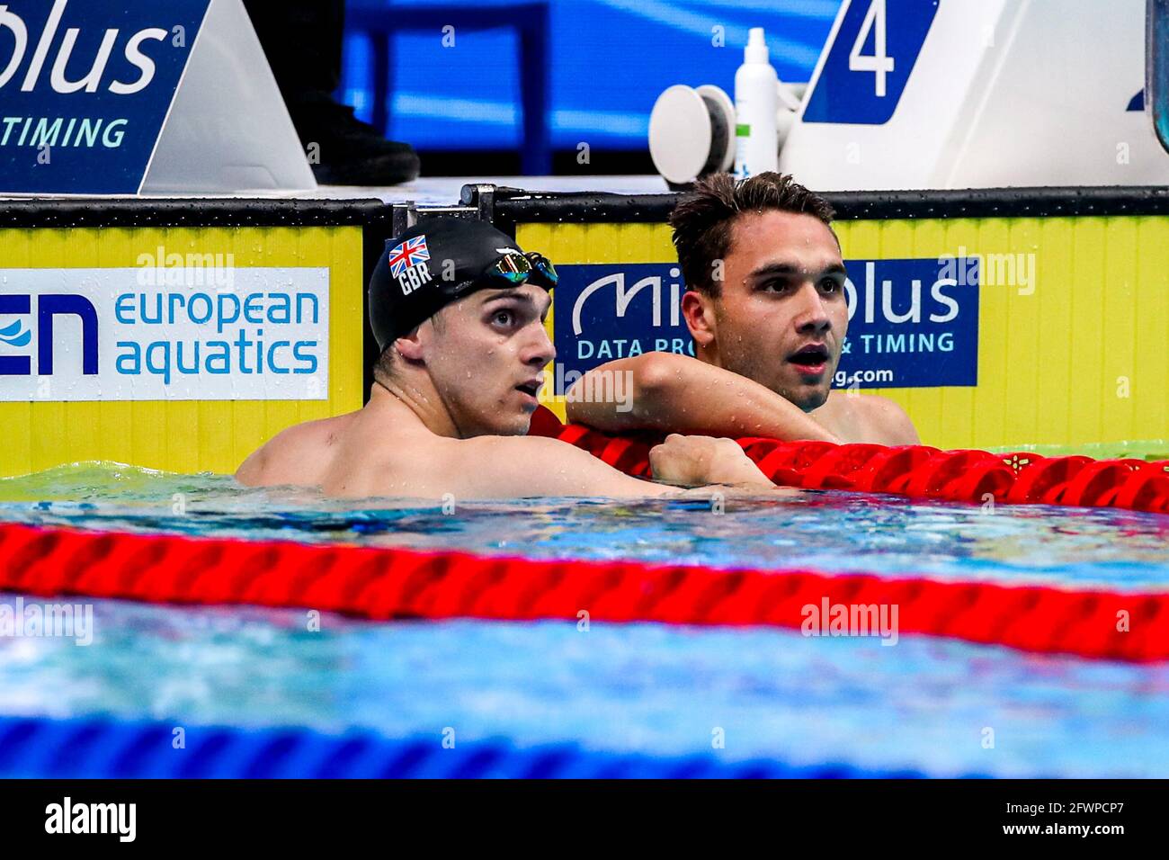 BUDAPEST, HUNGARY - MAY 23: James Guy of Great Britain, Kristof Milak of Hungary competing at the Men 100m Butterfly Final during the LEN European Aqu Stock Photo