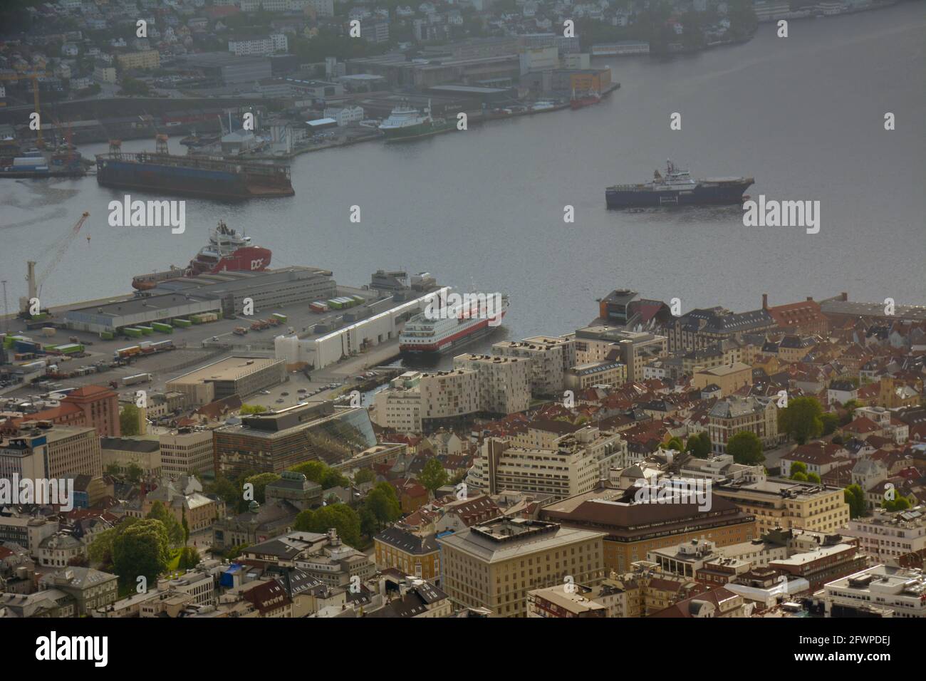 Bergen, Norway - 24th May, 2017: Beautiful close-up view of the city of Bergen from atop Mount Floyen on a hazy summer day. Stock Photo