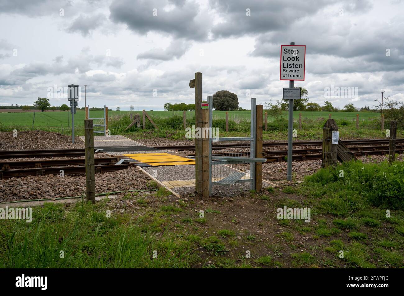 A view of a new public foot crossing over a railway line in Norfolk England Stock Photo