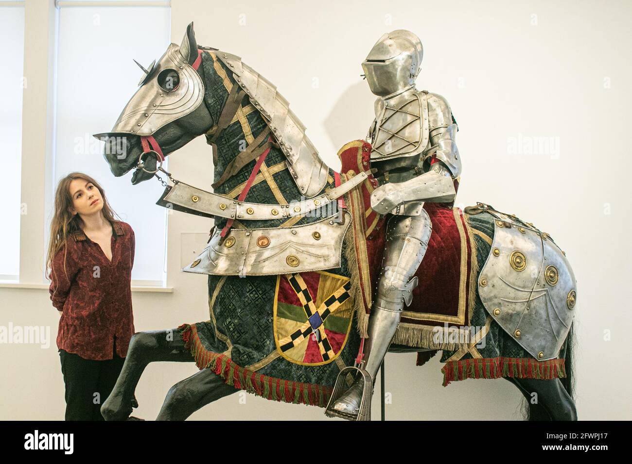 BONHAMS KNIGHTSBRIDGE LONDON 24 May 2021. An equestrian full armour for man and horse in German late 16th century style during a preview of Bonhams Antique Arms and Armour Sale. Built as an accurate reproduction inspired by two sets of armours on display in the world-famous Wallace Collection in London, this armour is an impressive, decorative example of a type that has not come onto the market since the 19th century. Estimate: £15,000 – 20,000. The sale will take place on 26 May at Bonhams Knightsbridge. Credit amer ghazzal/Alamy Live News Stock Photo