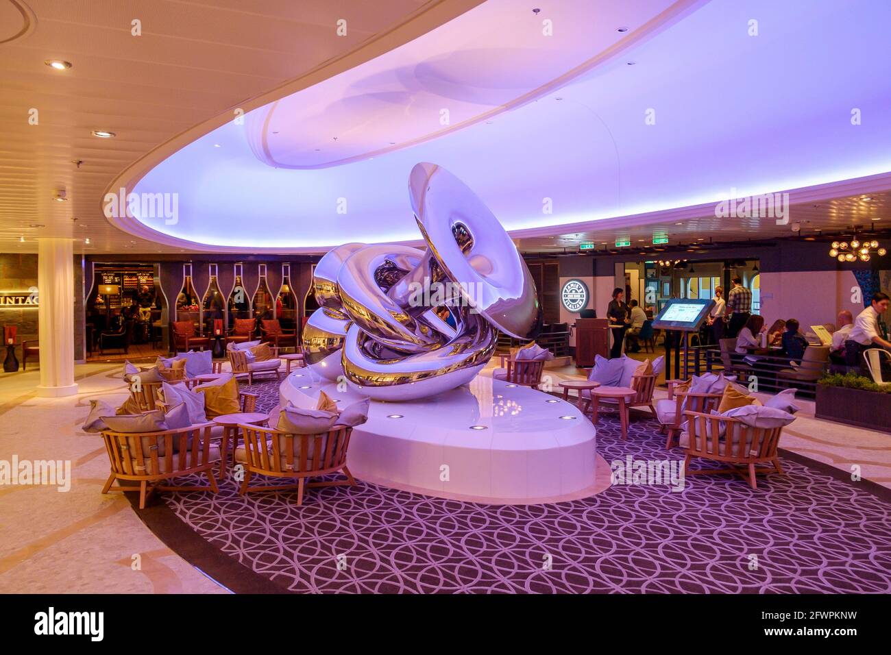 Art work, Eve by Artist Richard Hudson is a mirrored steel sculpture on board Royal Caribbean ship Anthem of the Seas. Stock Photo