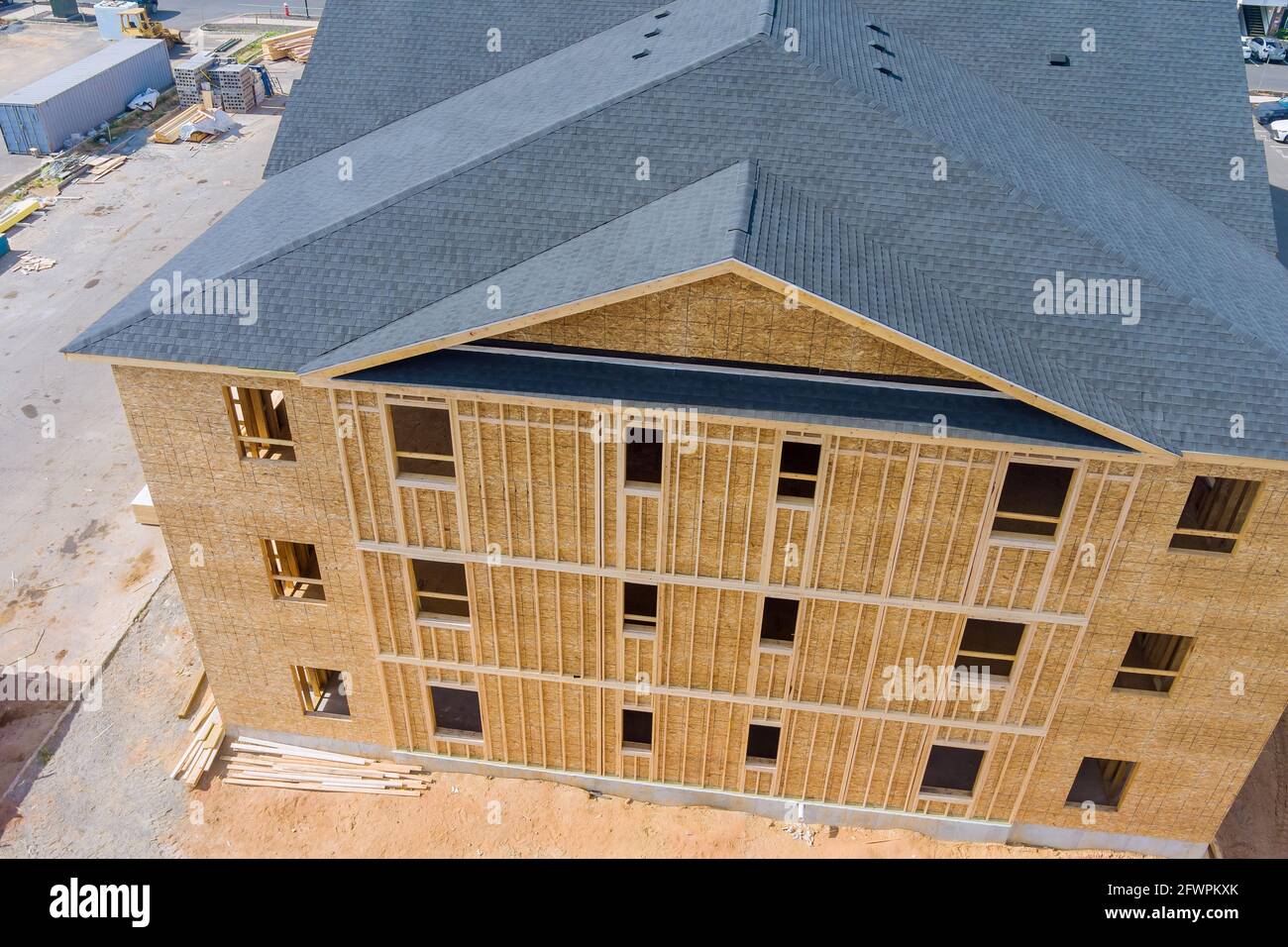 Wood building frame structure on a new development Stock Photo - Alamy