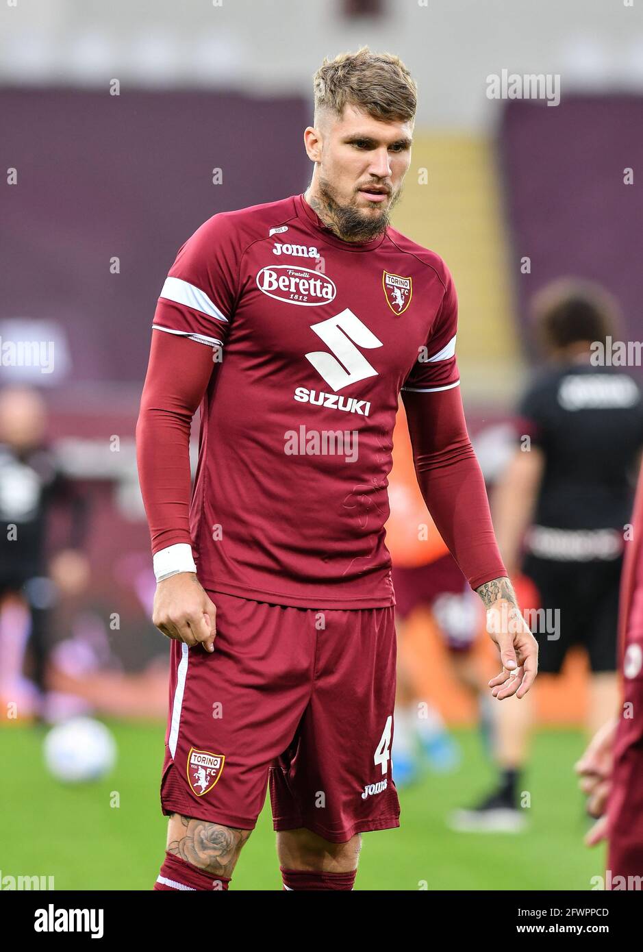 Santa Cristina Gherdeina, Italy. 24 July 2021. Lyanco Vojnovic (R) of Torino  FC competes for the ball with Emanuele Bocchio of SSC Brixen during the  pre-season friendly football match between Torino FC