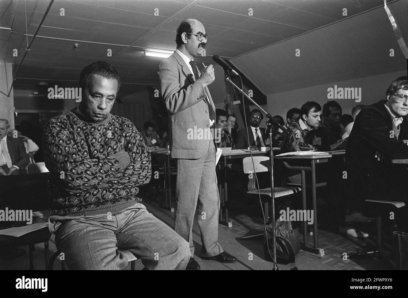 Mr. Janki (standing), Dr. Sedny (l), March 15, 1986, conferences, The Netherlands, 20th century press agency photo, news to remember, documentary, historic photography 1945-1990, visual stories, human history of the Twentieth Century, capturing moments in time Stock Photo