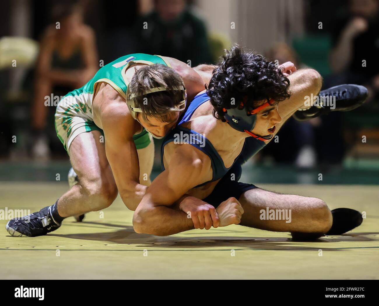 High School wrestling action under the spotlight with Coeur d'Alene vs