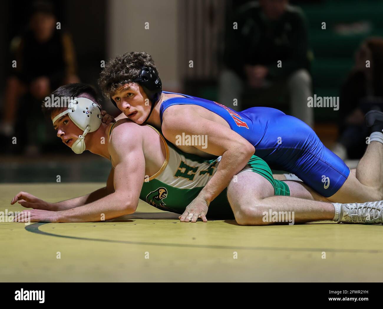 High School wrestling action under the spotlight with Coeur d'Alene vs