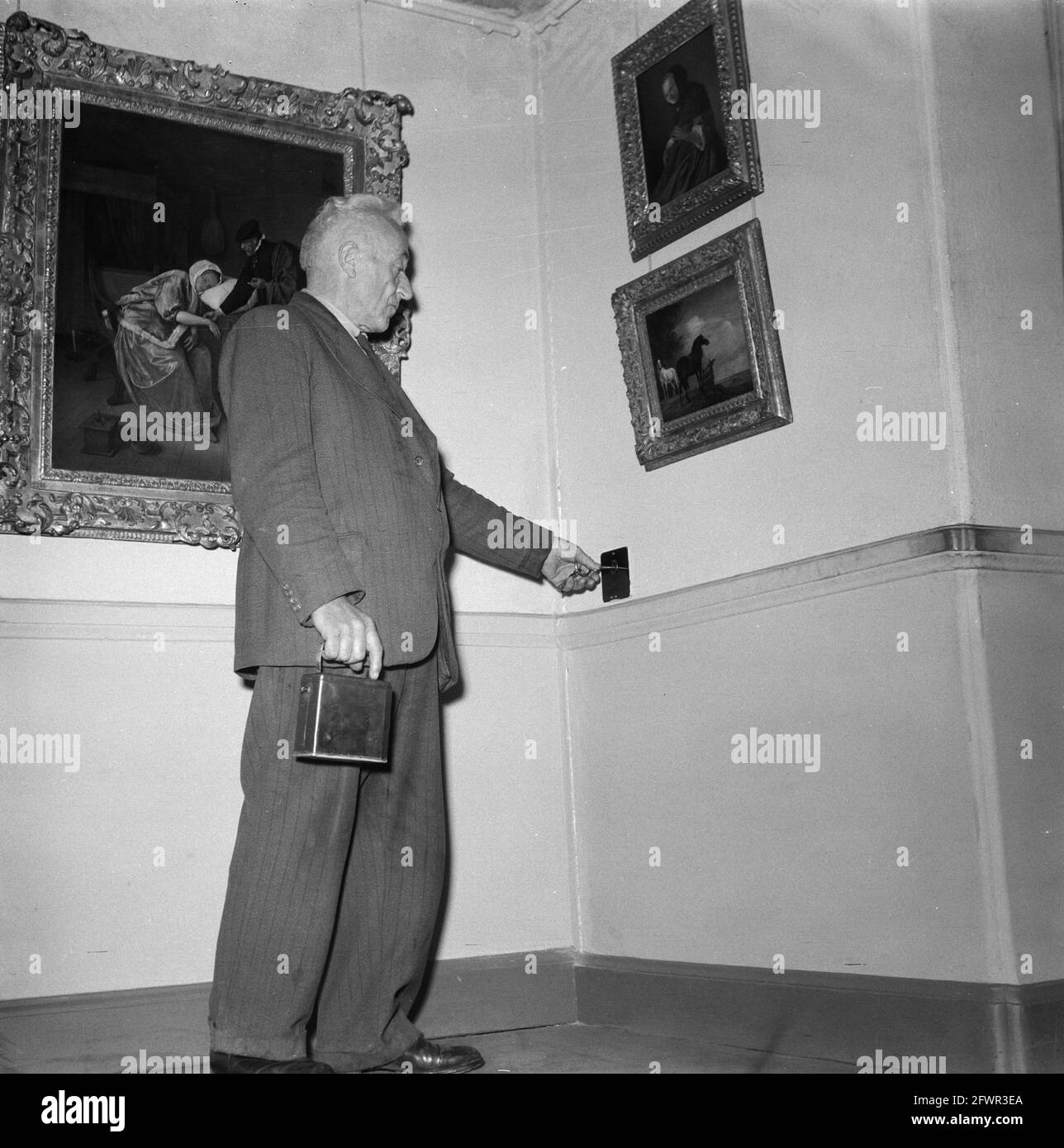 [Night watchman makes his rounds], July 1945, museums, exhibitions, The Netherlands, 20th century press agency photo, news to remember, documentary, historic photography 1945-1990, visual stories, human history of the Twentieth Century, capturing moments in time Stock Photo