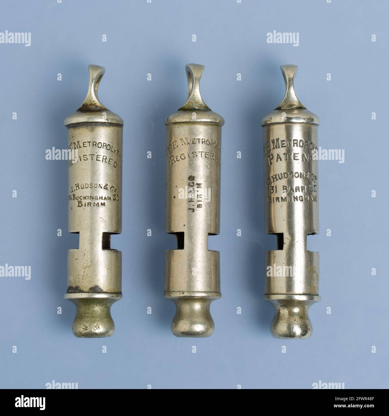 Three whistles made by J. Hudson and Co., Birmingham, dating from c. 1884, 1885 and 1886. Stock Photo