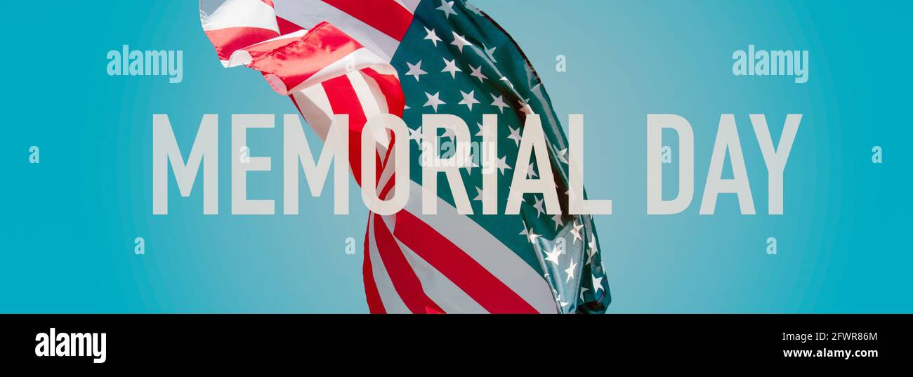 the text memorial day and a flag of the United States waving on the ...