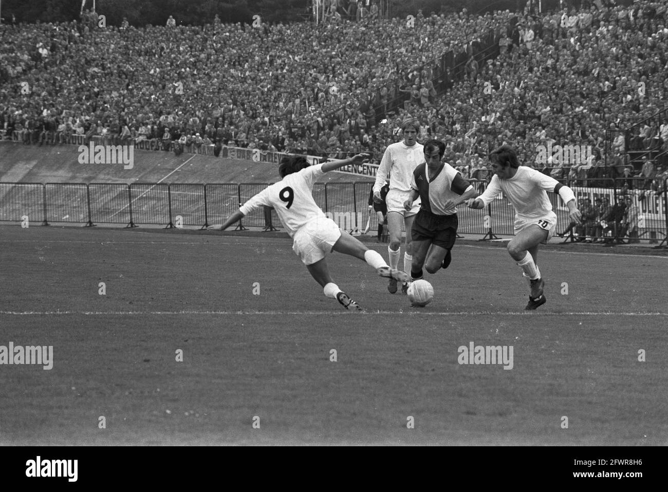 NEC against Feyenoord 1-2, Coen Moulijn in duel, August 29, 1971, sports, soccer, The Netherlands, 20th century press agency photo, news to remember, documentary, historic photography 1945-1990, visual stories, human history of the Twentieth Century, capturing moments in time Stock Photo