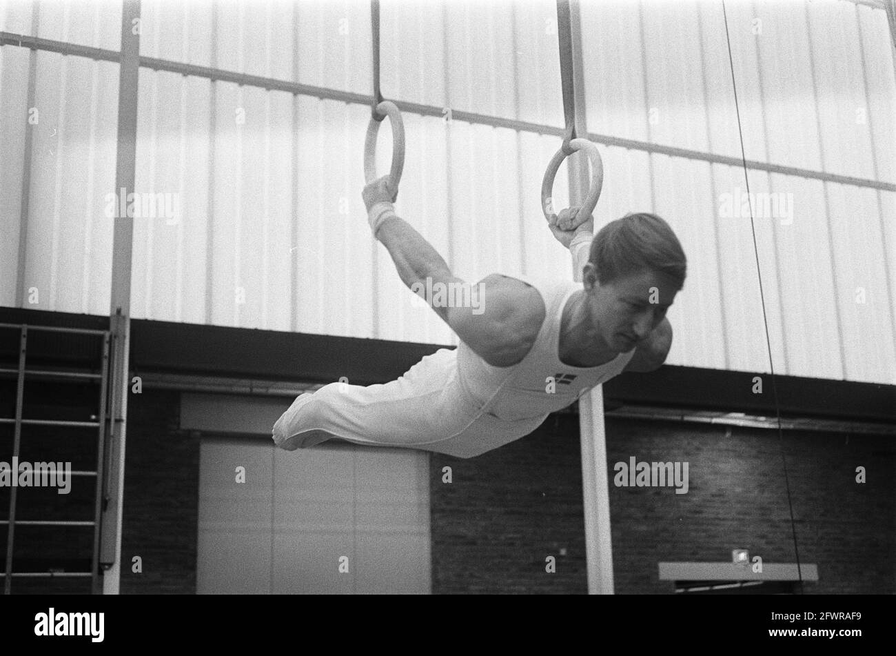 Netherlands against Denmark gymnastics at Zaandam. Hans Peter Nielsen (champion Denmark) on rings in action, November 16, 1969, TURN, The Netherlands, 20th century press agency photo, news to remember, documentary, historic photography 1945-1990, visual stories, human history of the Twentieth Century, capturing moments in time Stock Photo