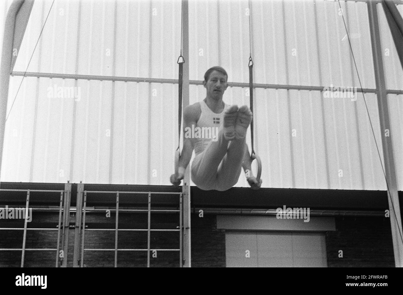 Netherlands v. Denmark gymnastics at Zaandam. Hans Peter Nielsen (champion Denmark) on rings in action, November 16, 1969, TURNEN, The Netherlands, 20th century press agency photo, news to remember, documentary, historic photography 1945-1990, visual stories, human history of the Twentieth Century, capturing moments in time Stock Photo