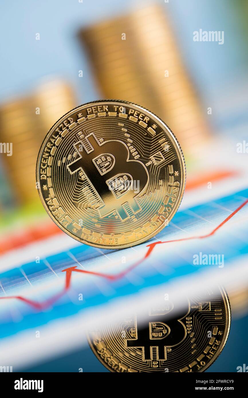 Virtual Currencies Bitcoin Example Virtual money, Currency. Bitcoin coins, financial chart Stock Photo - Alamy