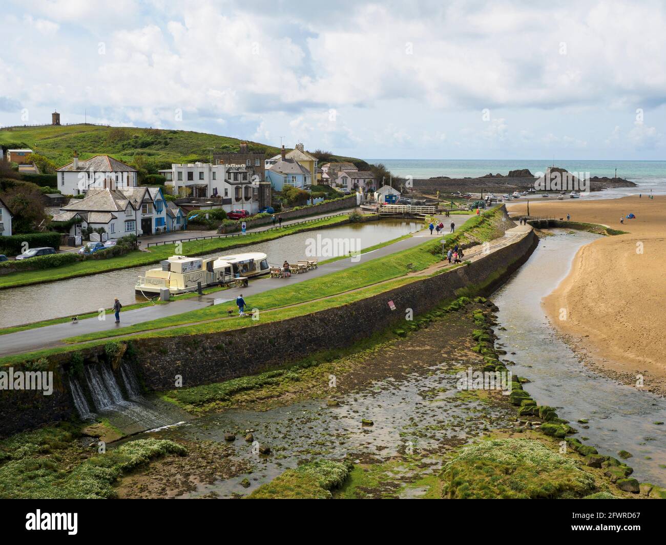 The barge cafe on the Bude canal where it meets the sea, Bude, Cornwall ...