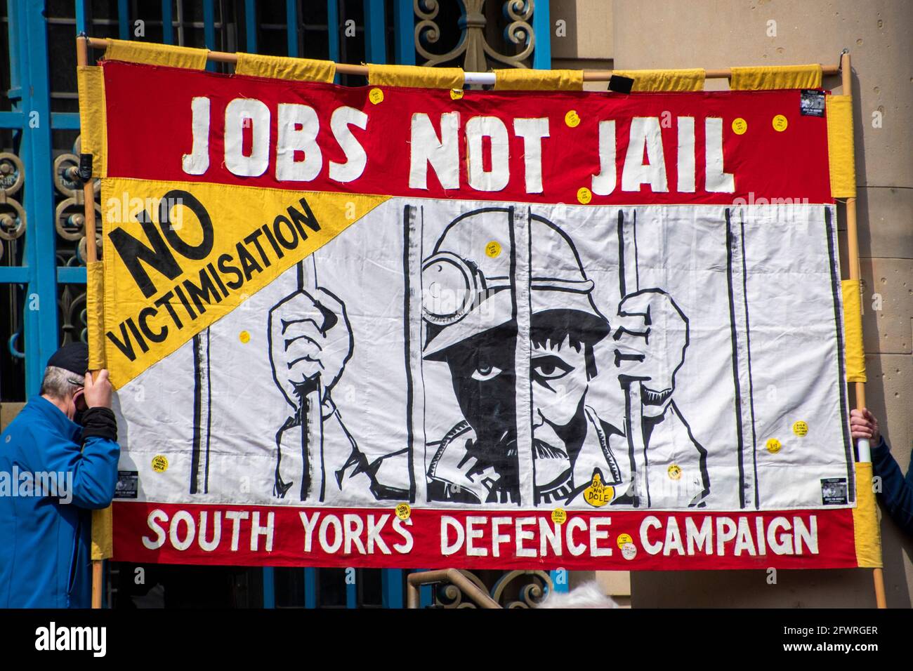 Sheffield, UK: 1st May 2021 : Jobs Not Jail Miner’s Strike banner on display on the steps of City Hall at The Kill The Bill protest, Barker’s Pool Stock Photo