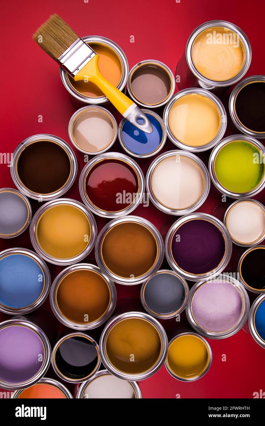 Open paint cans with a brush, Rainbow colors Stock Photo Alamy