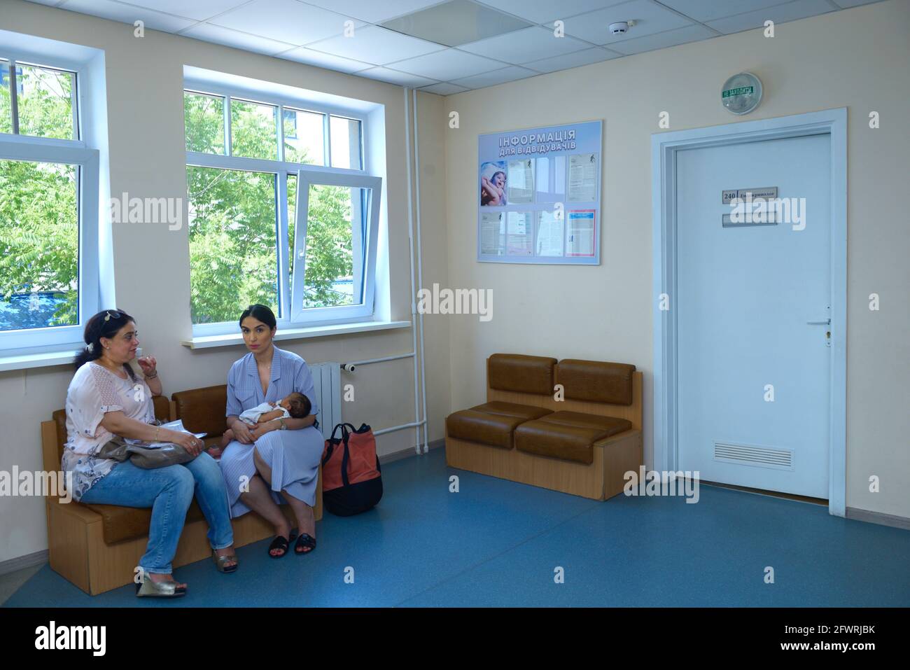 At the waiting room of the hospital. People sitting on couches waiting for doctor's appointment. June 4, 2019. Kiev Citycenter of neurosurgery. Kiev, Stock Photo