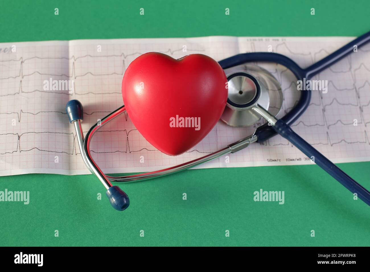 Cardiogram Medical Stethoscope Heart on green background Stock Photo ...