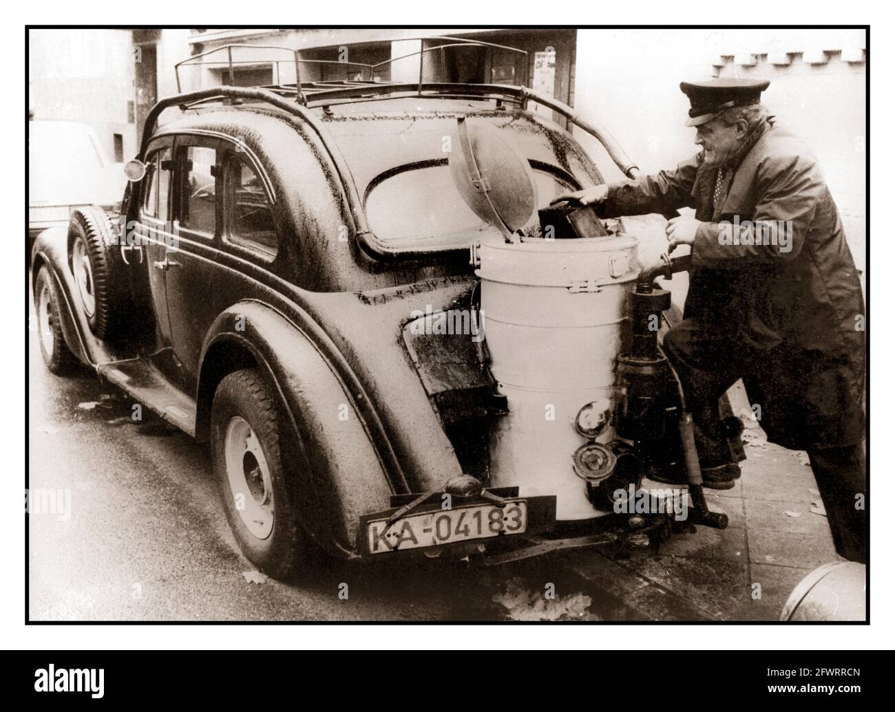 WAR FUEL CRISIS Vintage WW2 German 1936 Adler Diplomat car, with its innovative fuel that uses wood instead of petrol, fitted during World War II. Second World War saving fuel for the war effort Nazi Germany Stock Photo