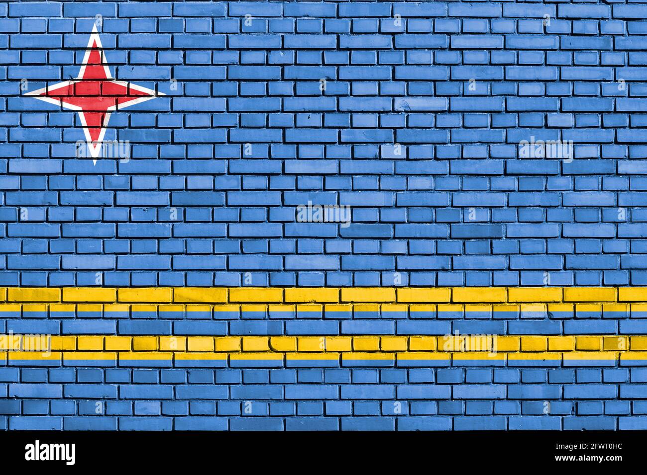 flag of Aruba painted on brick wall Stock Photo