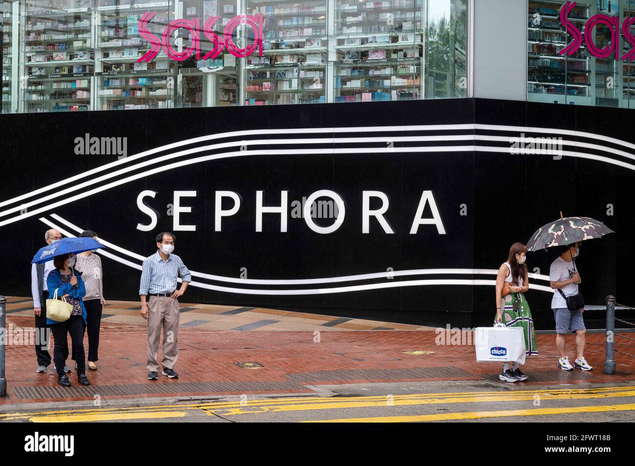 Pedestrians walk past the French sporting goods Decathlon and Australia's  largest clothing retailer Cotton On stores in Hong Kong. (Photo by Budrul  Chukrut / SOPA Images/Sipa USA Stock Photo - Alamy