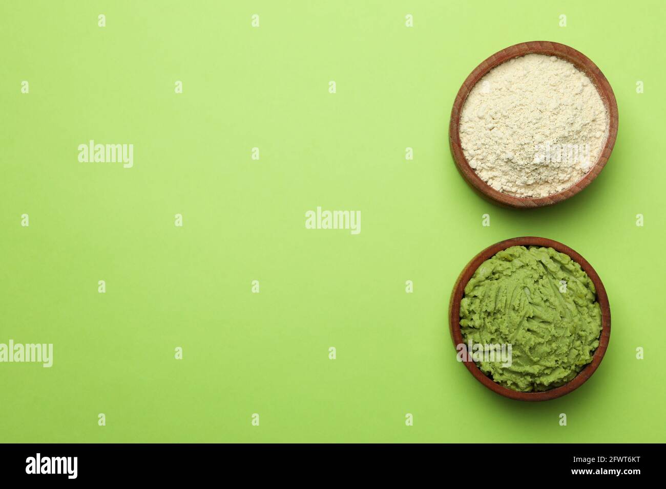 Wasabi and dry wasabi on green background Stock Photo Alamy