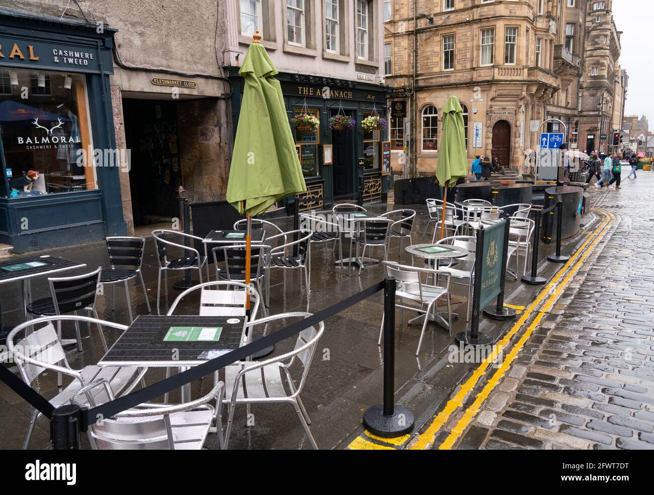 Empty outdoor restaurant seating hi-res stock photography and ...
