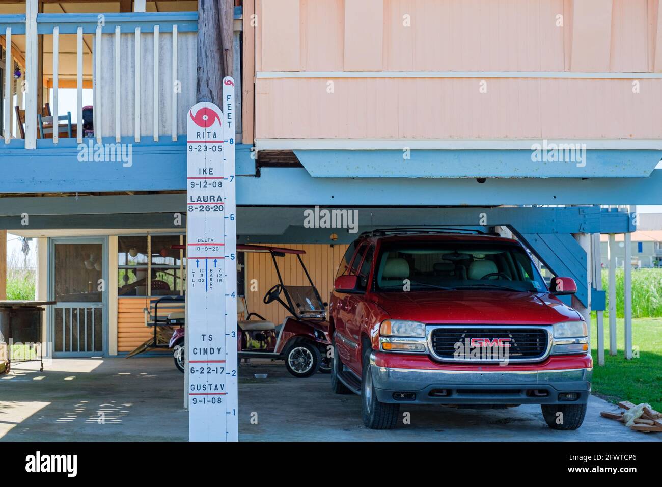 Cypremort Point, LA, USA - May 14, 2021: Flood stage marker showing differing water levels for tropical storms that came ashore on the Louisiana coast Stock Photo