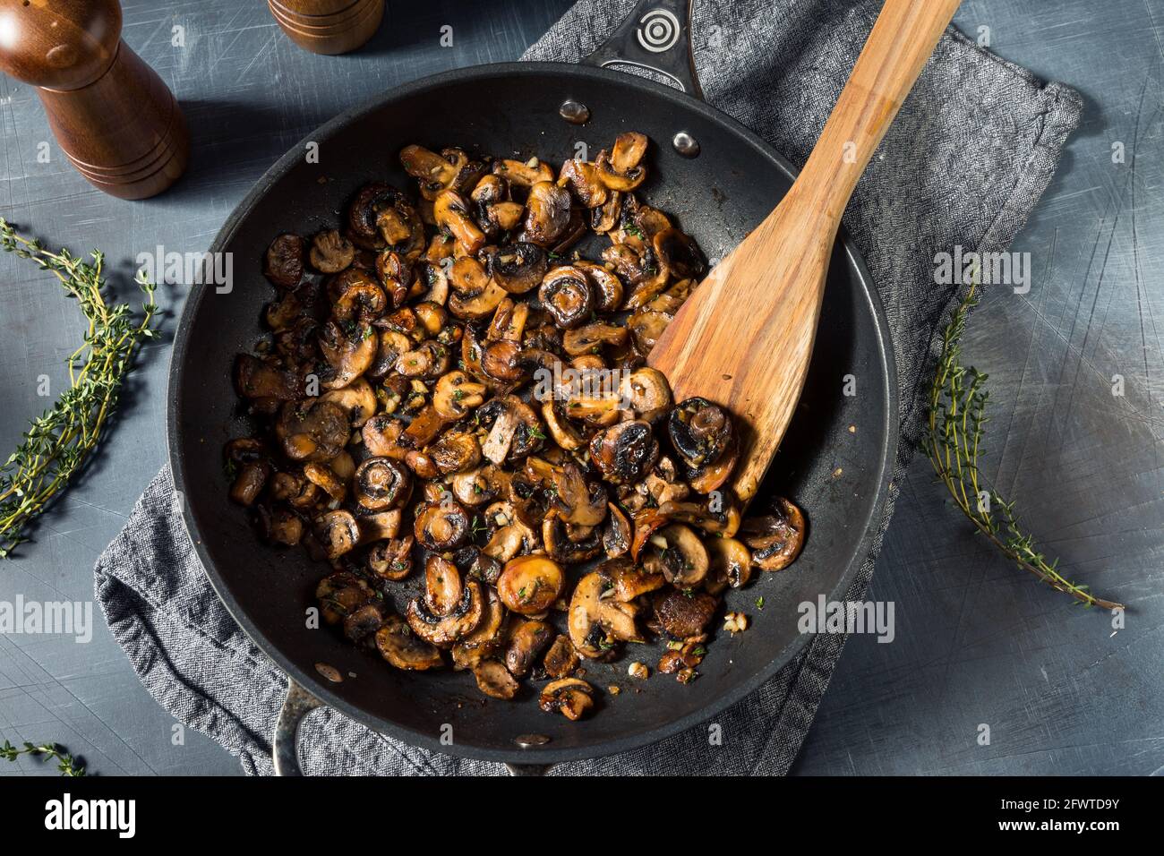 Homemade Healthy Sauteed Mushrooms with Butter and Thyme Stock Photo