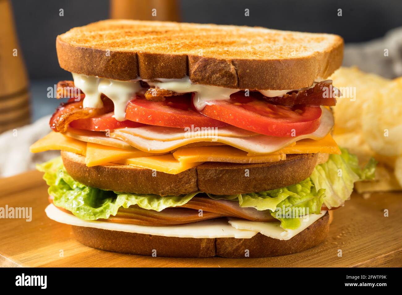 Homemade Turkey Club Sandwich with Bacon Tomato and Lettuce Stock Photo Alamy
