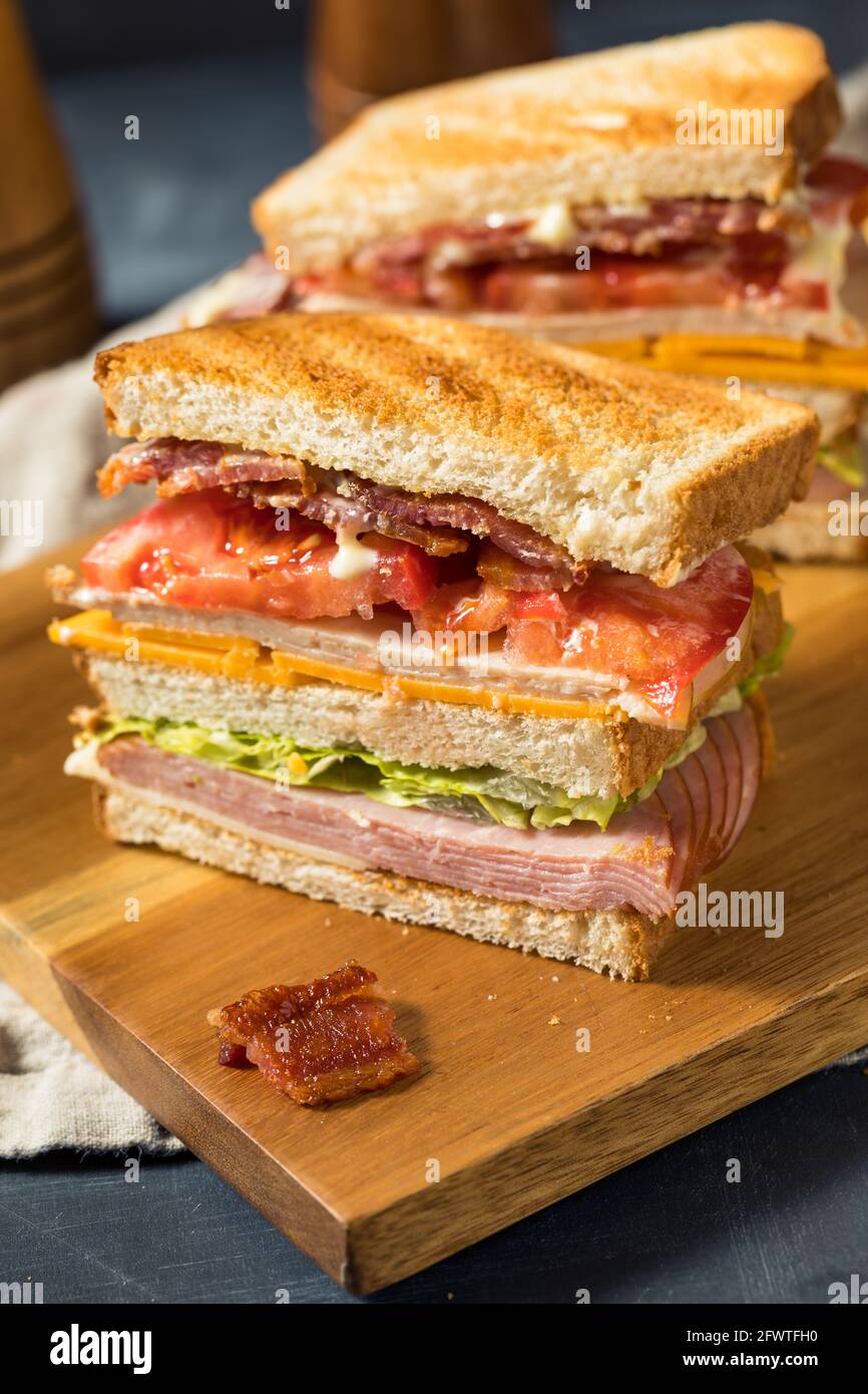 Homemade Turkey Club Sandwich with Bacon Tomato and Lettuce Stock Photo Alamy