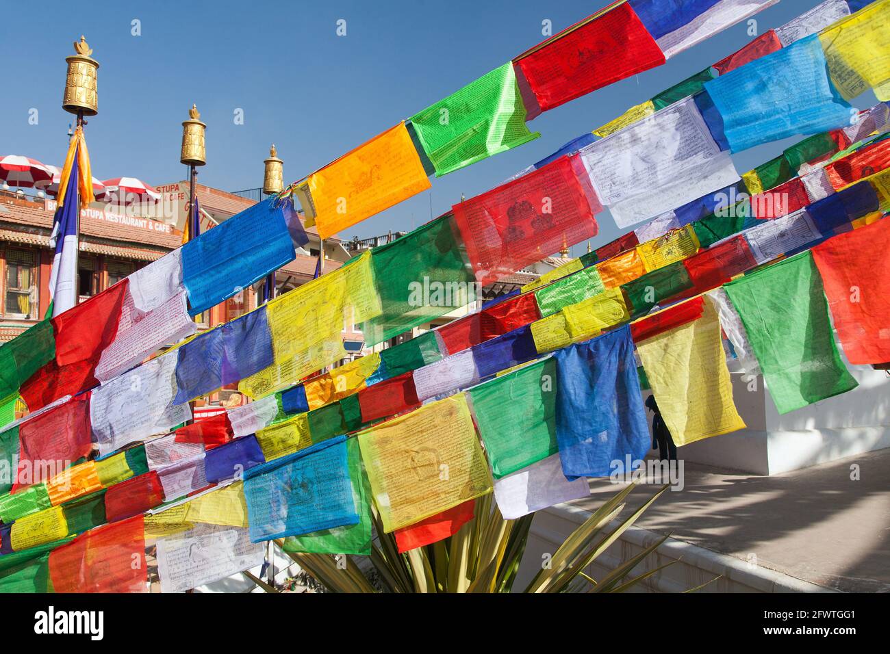 Prayer flags around Bodhnath, Bouddha, Bouddhanath or Bouddhnath stupa in Kathmandu, Nepal Stock Photo