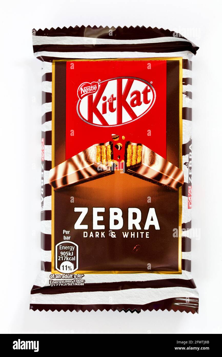 Four bars of crispy wafer fingers covered with white chocolate hires