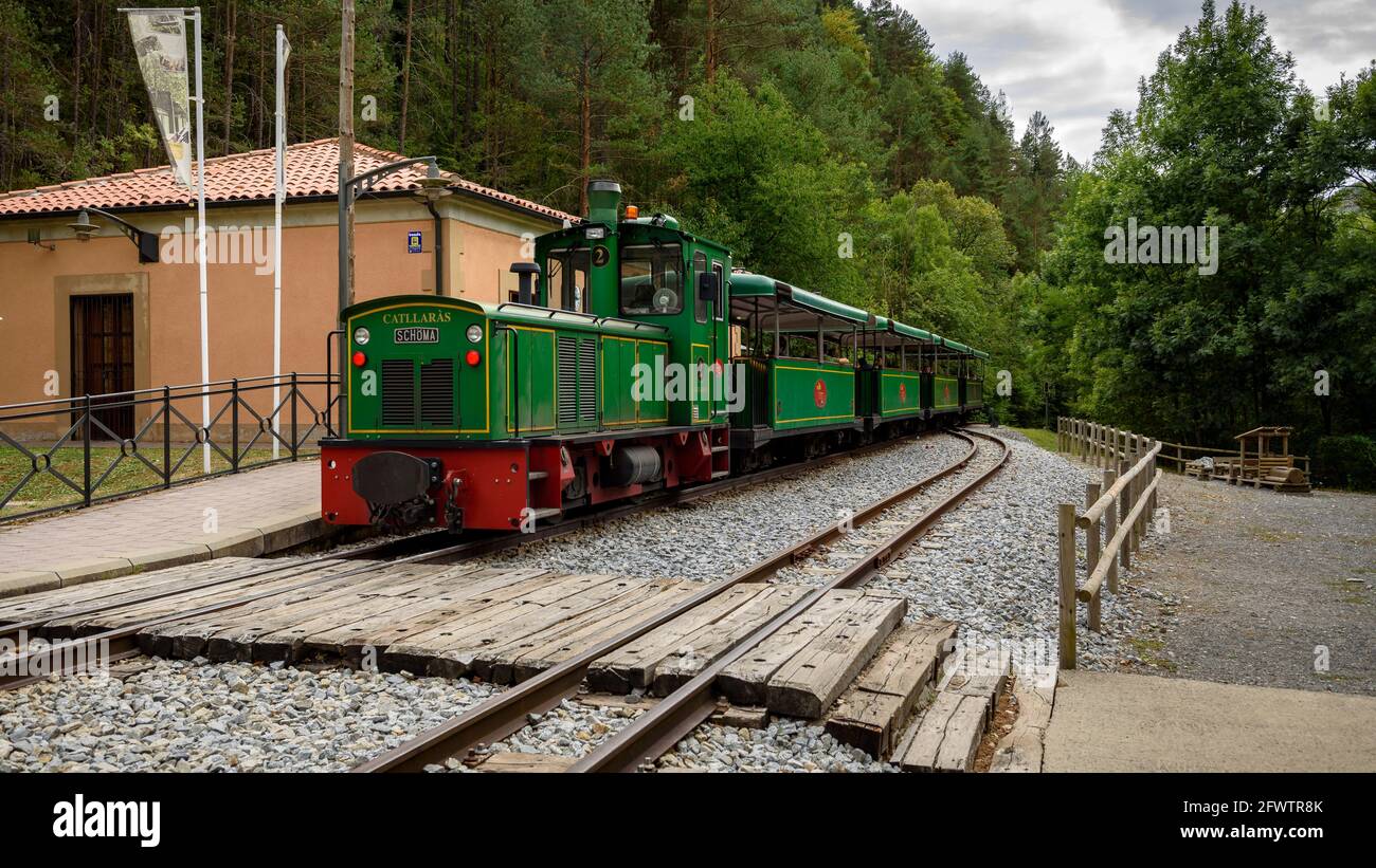 Tren del Ciment, at Clot del Moro station. The locomotive is named as the Catllaràs mountain range (Castellar de N'Hug, Catalonia, Spain) Stock Photo