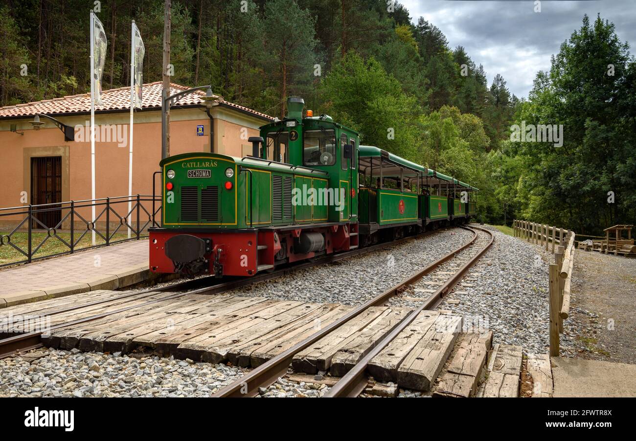 Tren del Ciment, at Clot del Moro station. The locomotive is named as the Catllaràs mountain range (Castellar de N'Hug, Catalonia, Spain) Stock Photo
