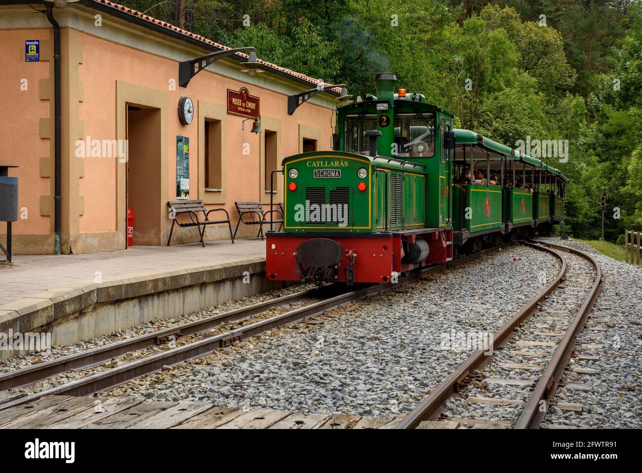 Tren del Ciment, at Clot del Moro station. The locomotive is named as the Catllaràs mountain range (Castellar de N'Hug, Catalonia, Spain) Stock Photo